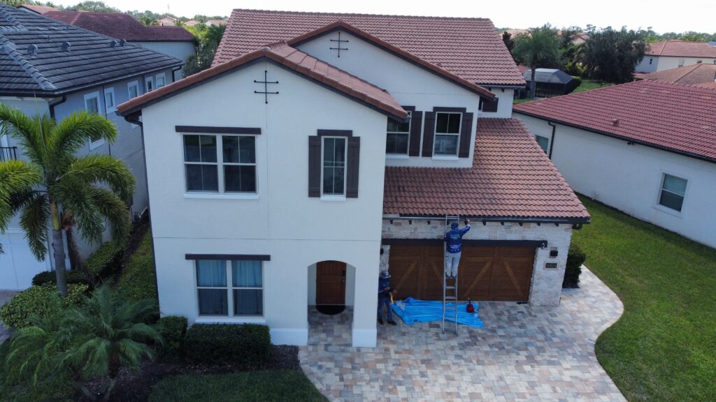 Drone shot of residential neighborhood with tile roofs in Central Florida